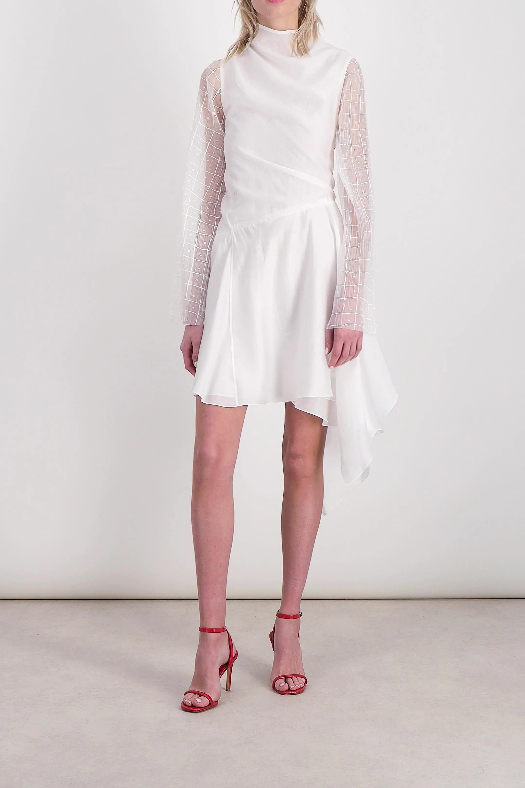Fluid asymmetric dress with sheer trumpet sleeves